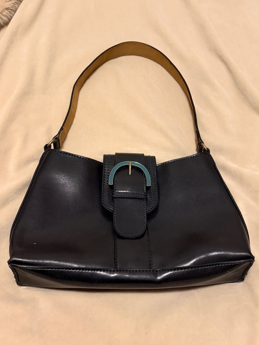 Classic Black Leather Shoulder Bag with Teal Buckle Accent
